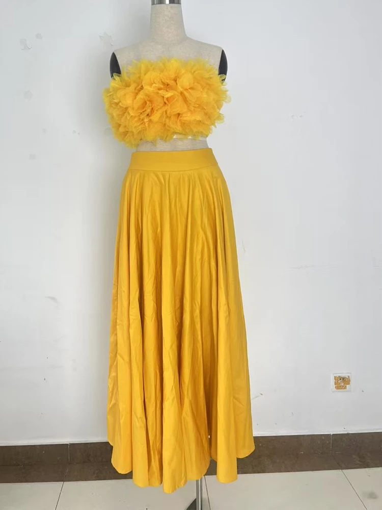 In de zomer van 2025, het nieuwe damespak met driedimensionale bloem elastische sexy tube top en hoge taille A-vormige rok se