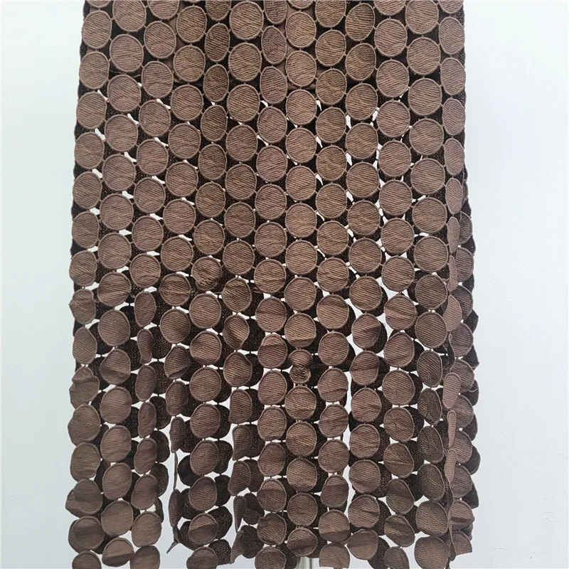 ANJY 2026 primavera nueva moda mujer 2 piezas conjunto diseño único gancho flor encaje hueco Top tendencia Chic Ins Streetwear falda A16972