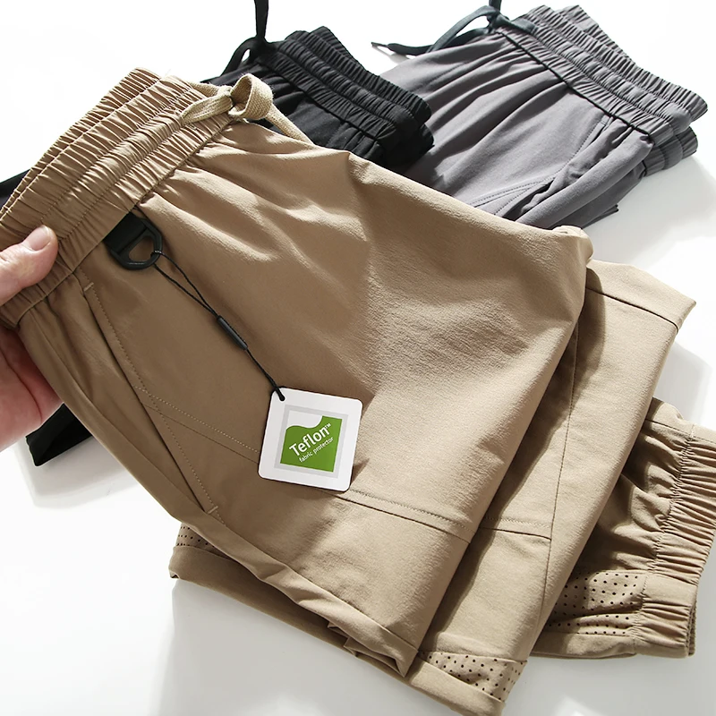 

Лазерно-резные дышащие быстросохнущие водонепроницаемые мужские летние модные спортивные повседневные брюки свободного кроя с прямыми штанинами