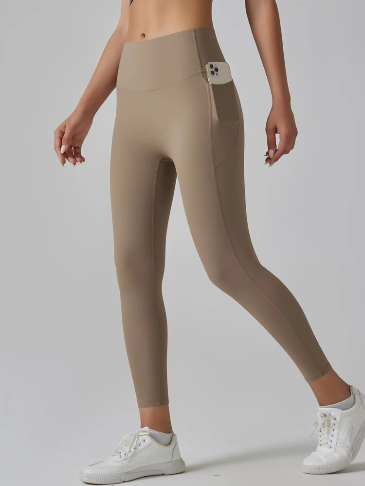 여성 의류 요가 레깅스 스포츠웨어 패션 캐주얼 솔리드 컬러 타이트 바지 여성용 포켓 달리기 피트니스 짐 롱 팬츠
