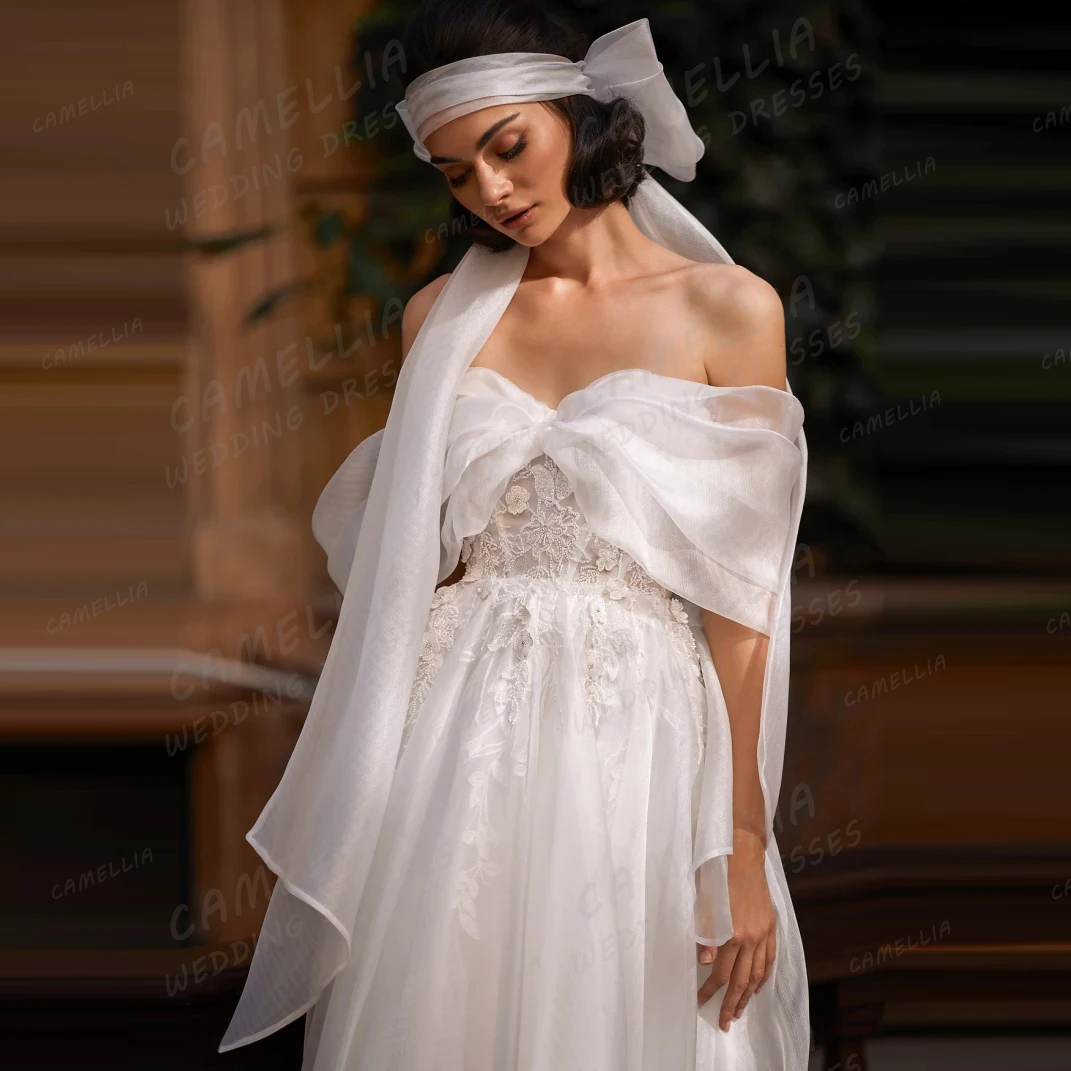 فساتين زفاف بسيطة من الدانتيل بدون أكتاف للنساء على شكل حرف A مزينة بالتول زي العرائس بدون ظهر للحفلات فيستدوس دي نوفيا حسب الطلب