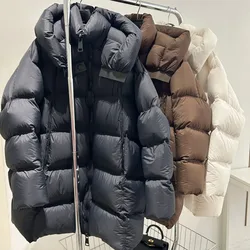 Piumino da donna invernale di lusso in piumino d'anatra bianco 2024 nuovo piumino con cappuccio di media lunghezza Parka impermeabile caldo spesso allentato