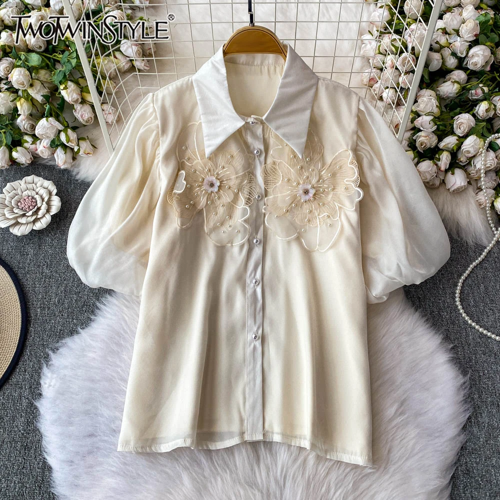 

TWOTWINSTYLE Solid Spliced Appliques Blouses For Women Lapel Puff Sleeve Temperament Shirts Female Fashion Style New KBL536984