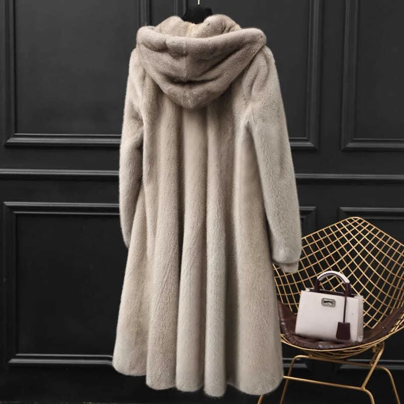 

A new mid-length women's fur and coat with hood for warmth