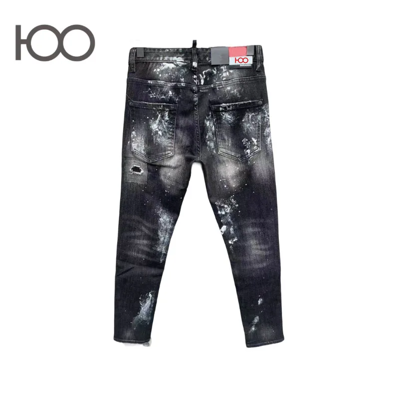 100 C096 Jeans with slim fit, vintage wash, distressed holes with frayed edges, paint splatters – a trendy cool punk style.