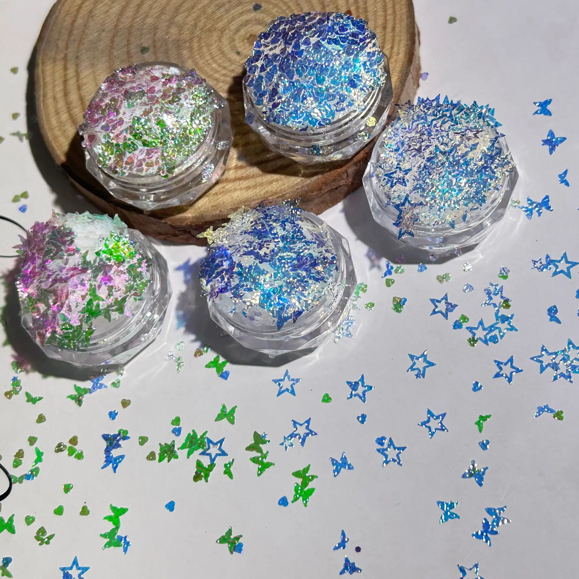 Nuovo scintillante blu glitter per unghie in rilievo farfalla sottile piccolo cuore stella cava Aurora rosa accessori per unghie decorazione fai da te