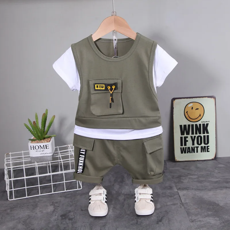 Nueva ropa de verano para bebés y niños pequeños, conjunto de 2 piezas de camiseta con bolsillo y cordón para niños, pantalones cortos, chándal de moda para bebés y niños