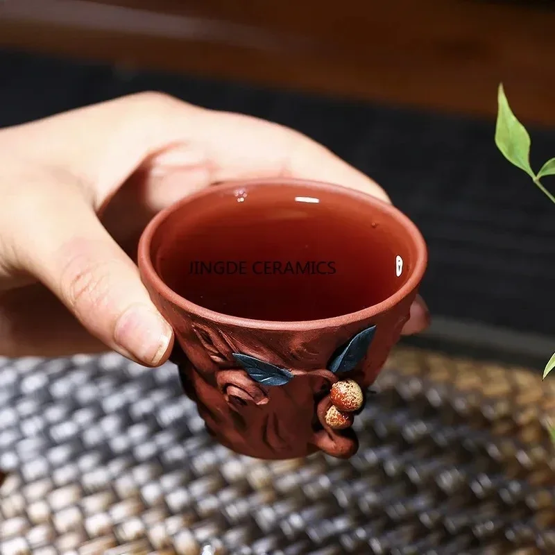 

2pcs Chinese Yixing Purple Clay Teacup Travel Meditation Cup Handmade Sculpture Peach Model Tea Bowl Pu'er Tea Set 60ml
