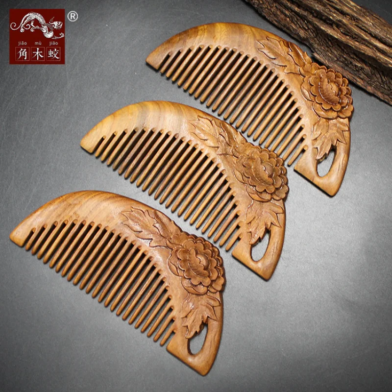 

Green sandalwood comb carved with peonies, solid wood massage hair comb