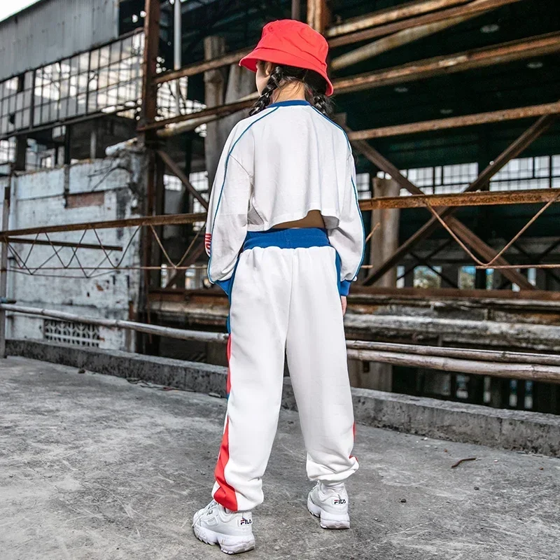 La nuova versione coreana del vestito da ballo di strada da ragazza, top corto a maniche lunghe, abbigliamento per spettacoli di danza jazz per bambini