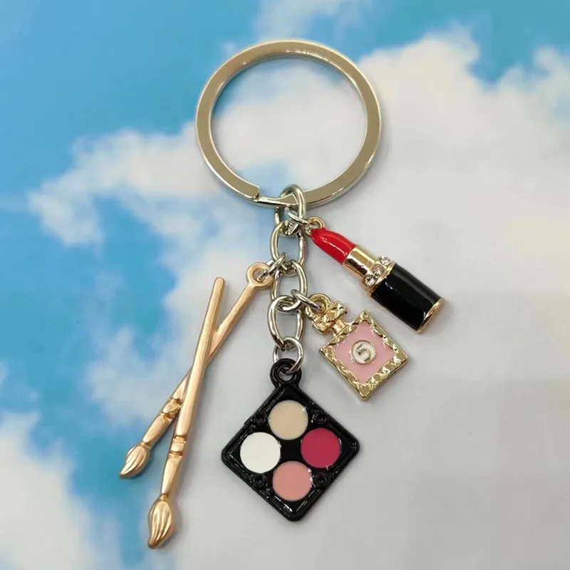 Fashion Beauty Cosmetics Key Chain Lipstick Makeup Pen perfume Bottle Enamel Mixed Powder Makeup Key Chain Beauty Jewelry