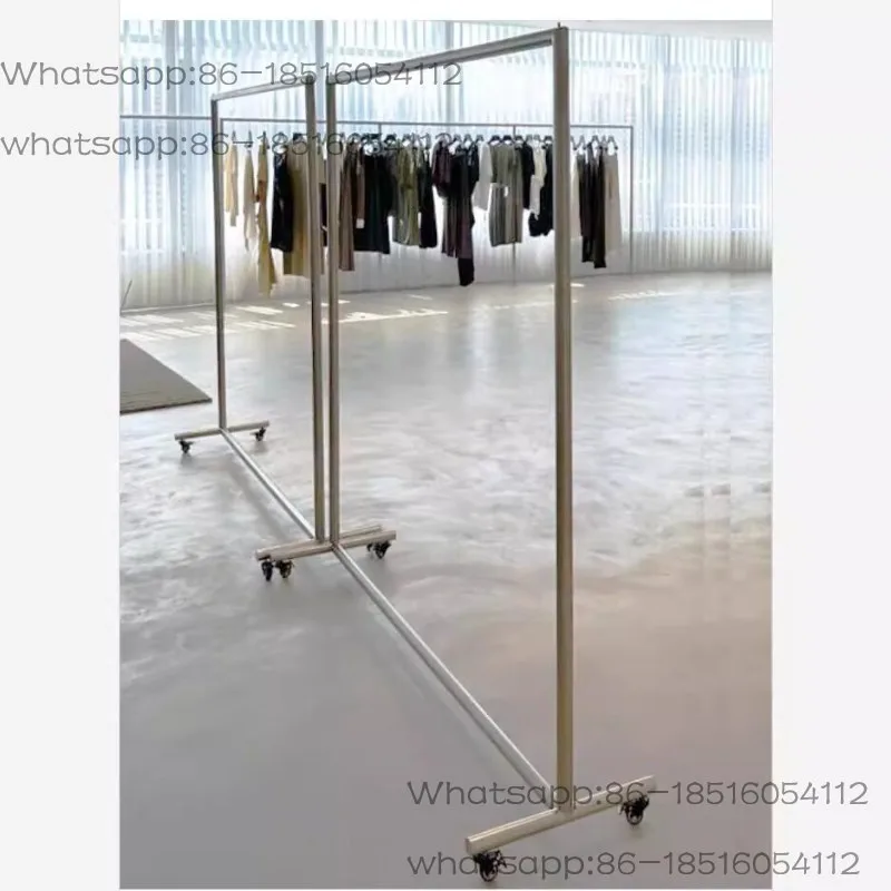 expositor-de-ropa-para-tienda-perchero-movil-de-acero-inoxidable-de-suelo-a-techo-estanteria-zhongdao-para-tienda-de-ropa-femenina