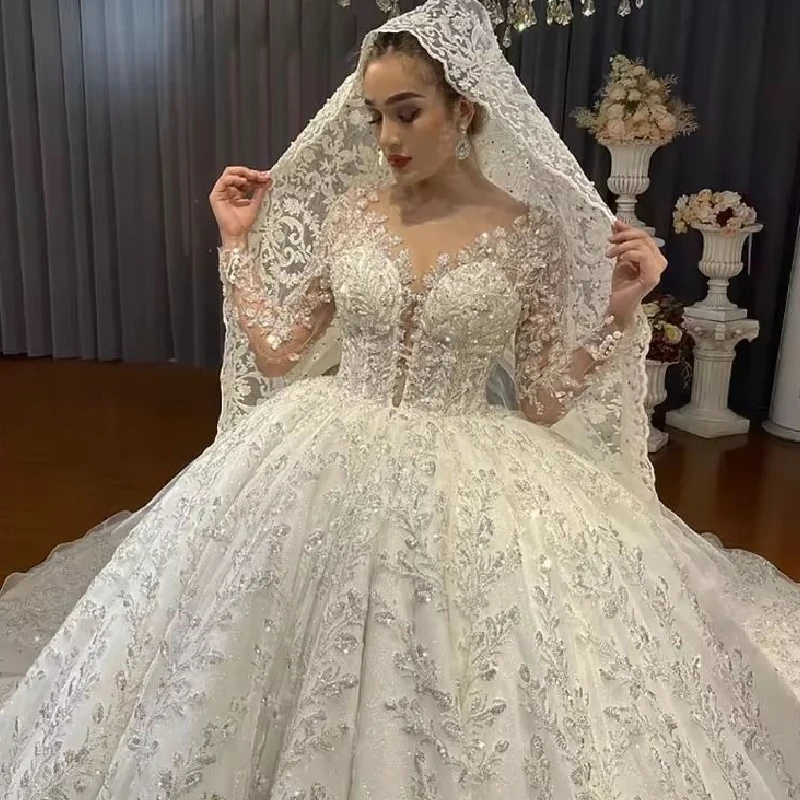 فستان زفاف رائع مخصص للنساء بأكمام طويلة مزين بالترتر فستان زفاف برقبة دائرية فستان زفاف فيستدو دي نوفيا