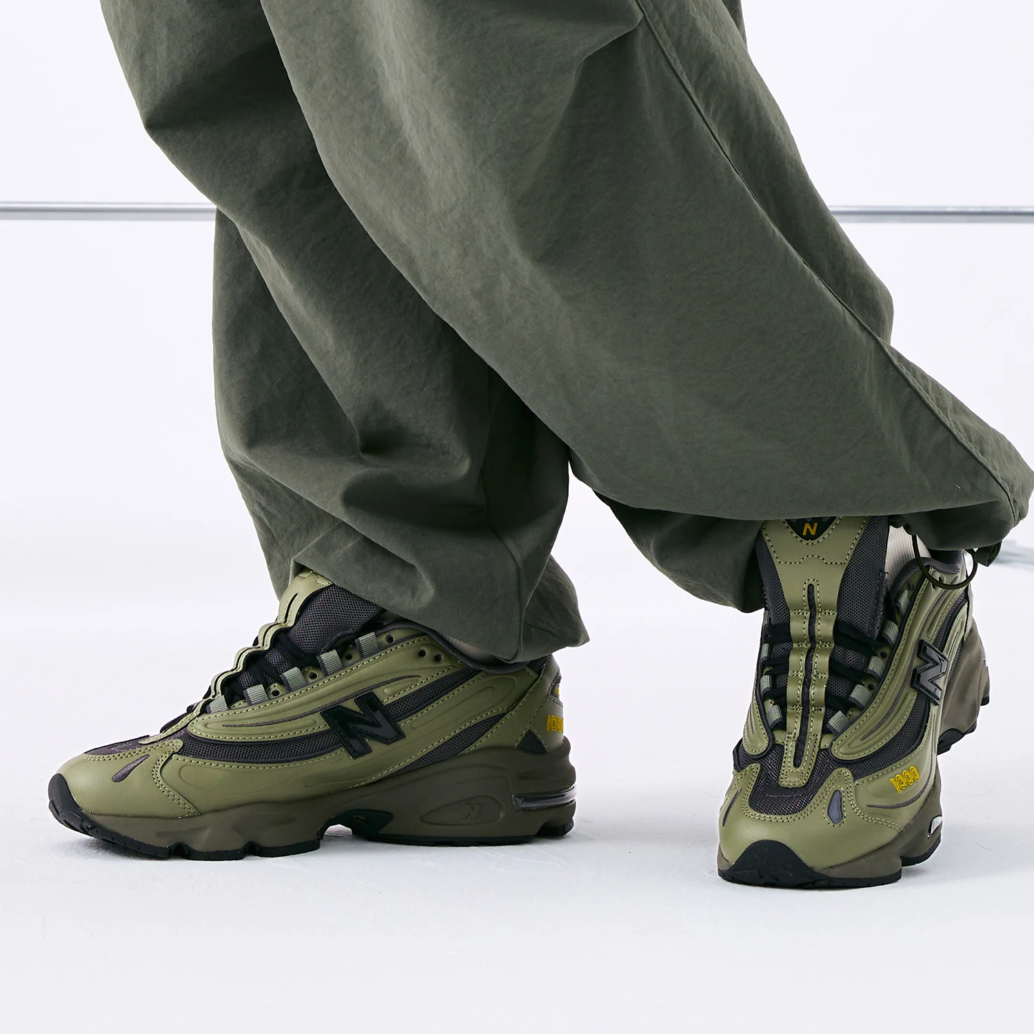 New Balance NB 1000 - حذاء جري كاجوال منخفض القطع للرجال والنساء، لون أخضر عسكري