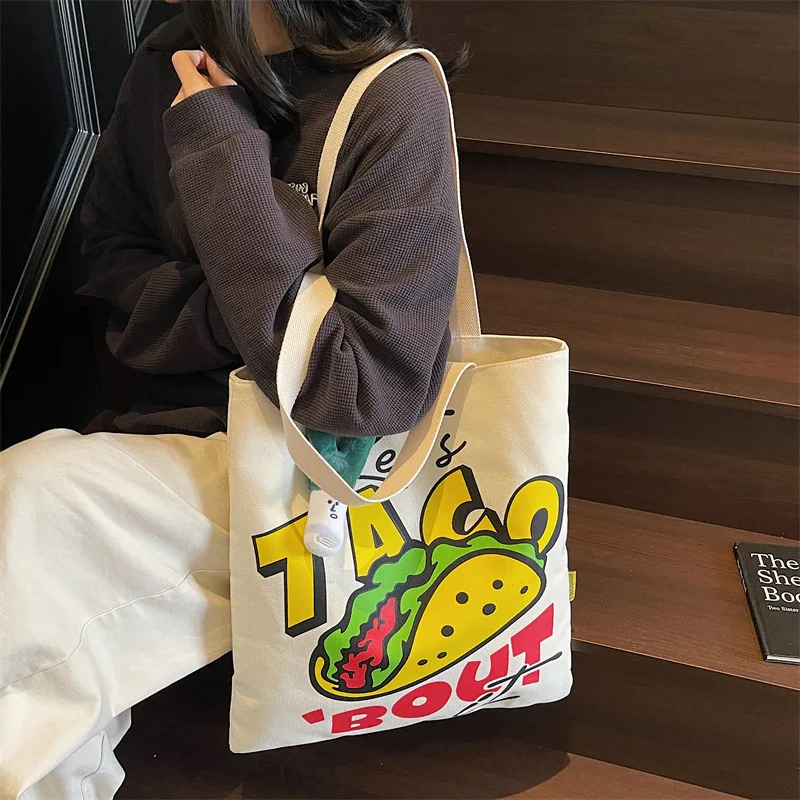 

2025 Новая парусиновая большая сумка для женщин, большая вместительная сумка на плечо с принтом, студенческая пригородная ручная модная сумка