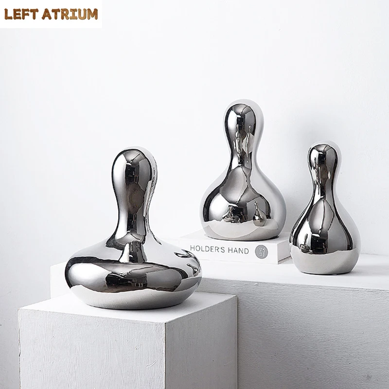 

Silver Bowling Ball Bottle Ceramic Ornaments Desk Decoration Bowling Ball Bottle Sculpture Room Aesthetics Decor Modern Artwork