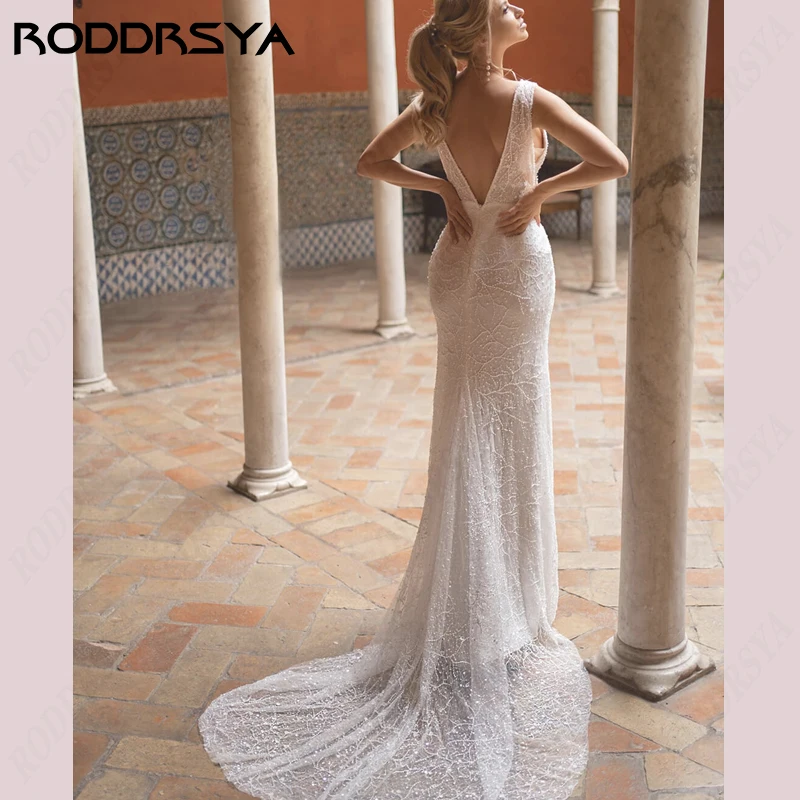 فستان زفاف بحورية البحر من RODDRSYA برباط على شكل حرف v عميقة بدون ظهر Vestido De Novia طول الأرض فستان زفاف على الشاطئ بدون أكمام لحفلات العروسبرباط على شكل حرف v عميقة بدون ظهر Vestido De Novia طول الأرض فستان زفاف ع