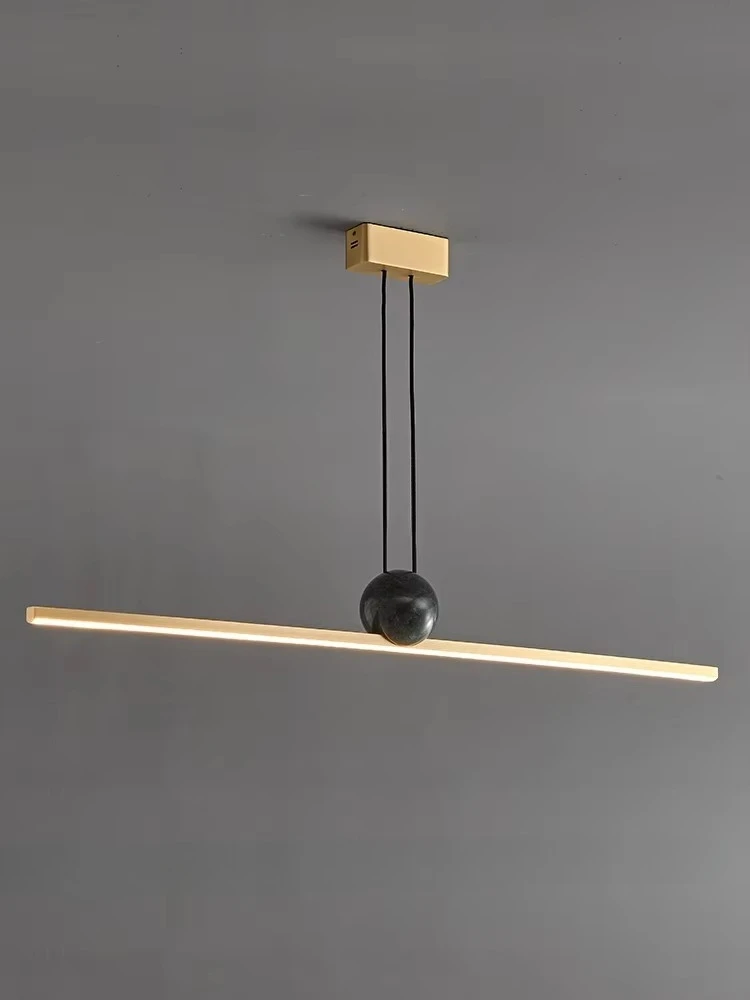 *Italian minimalist one-word restaurant marble bar counter all-copper strips hanging luminous objects