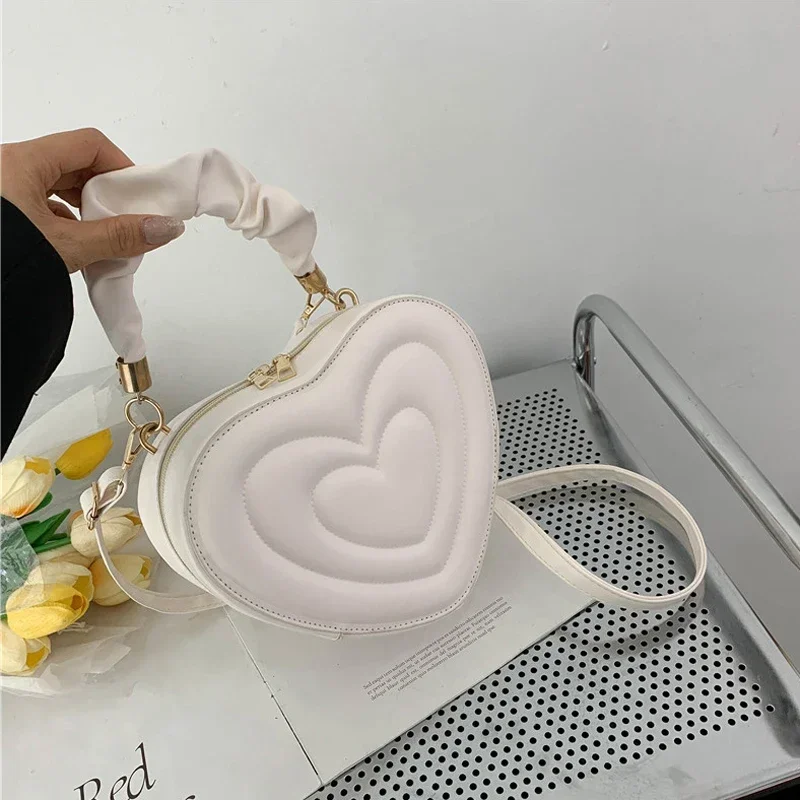 Retro heart-shaped cute bag fashion shoulder messenger bag solid color girl new shopping handbag