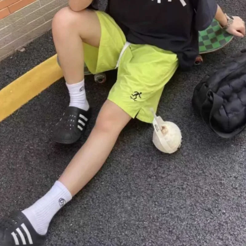 شورت نسائي صيفي جديد مريح سريع الجفاف بخصر مطاطي على الطراز الكوري تصميم فضفاض كبير الحجم رياضي يومي غير رسمي بسيط يناسب الجميع #1