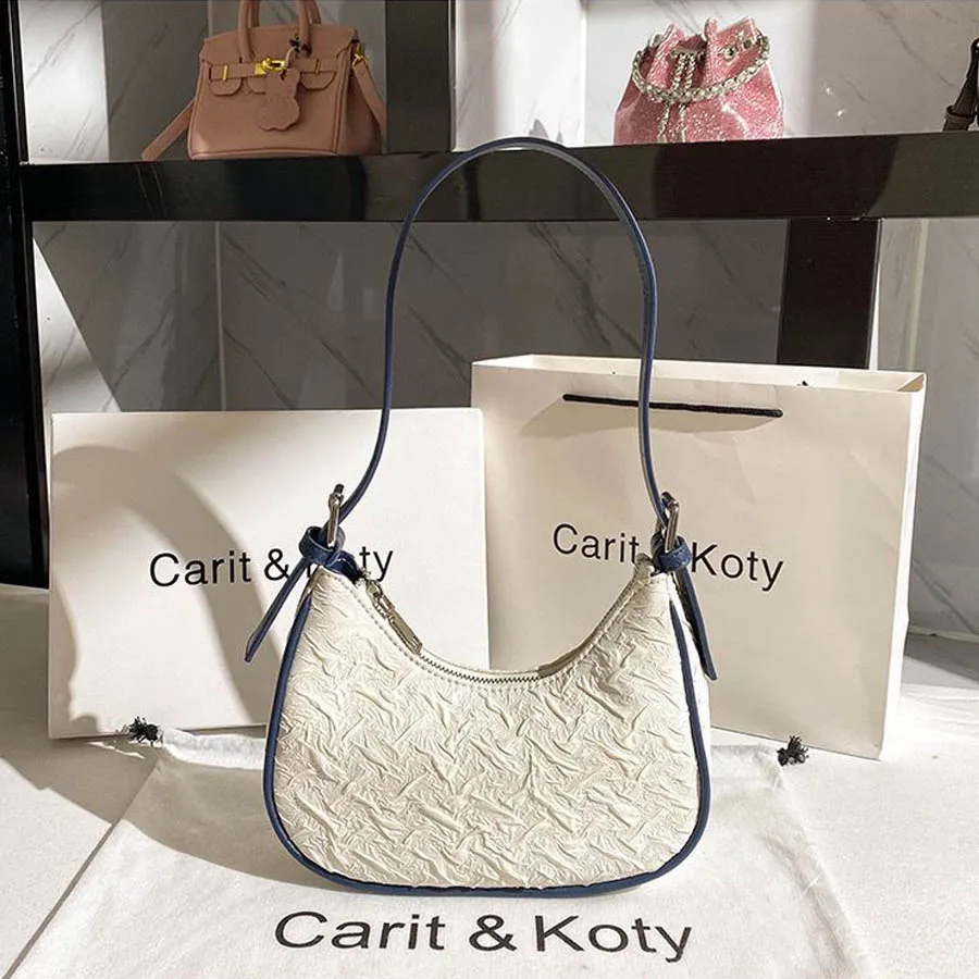 Original design advanced sense this year's popular pleated bag female summer niche design crescent bag underarm bag shoulder