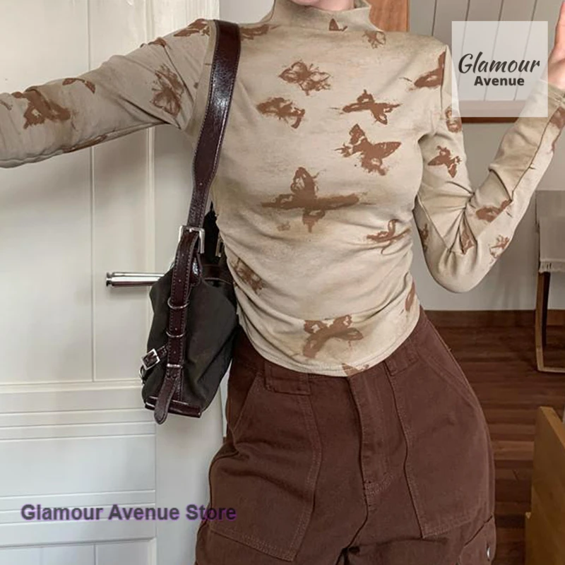 الأمريكية الرجعية التوابل فراشة طباعة شبه عالية الرقبة طويلة الأكمام تي شيرت المرأة الربيع والخريف تصميم مطوي البنطال القصير