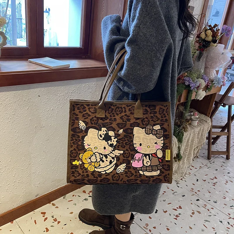 Sanrio Hello Kitty tas kanvas wanita, kapasitas besar Vintage pola macan tutul tas belanja lucu kartun tas Tote tas tangan bahu