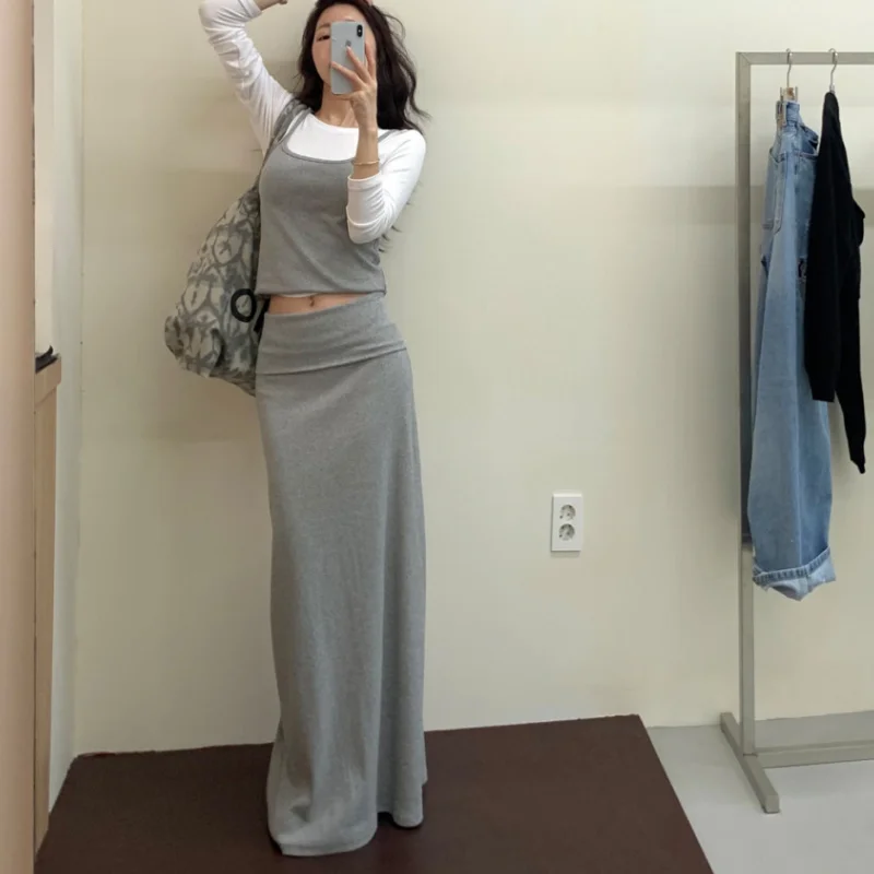 

Fashionable Comfortable Slim Fit Short Strap Vest And Floor Length Halter Skirt Two Piece Set New Arrival Dongda Gate
