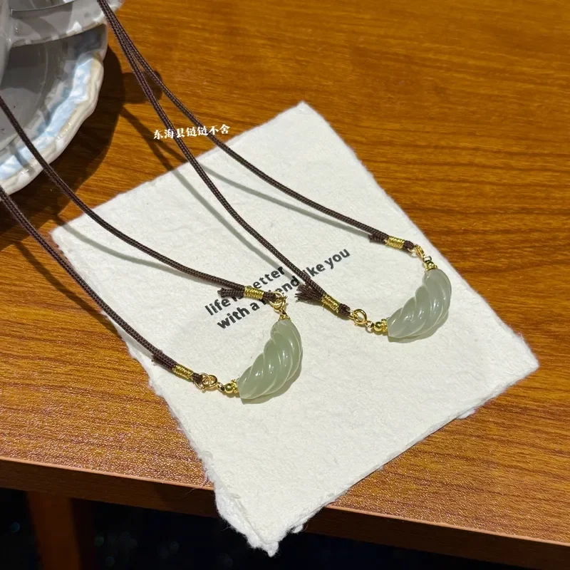 Natural Hetian jade croissant bag twisted silk pattern pendant smiling crescent moon pendant necklace female gift niche