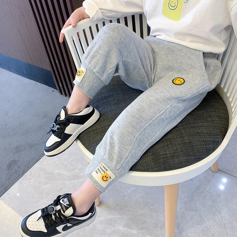 

Girls thin trousers 2022 new spring and autumn children's sports pants knitted elastic pants cheap cartoon smiley shorts for boy