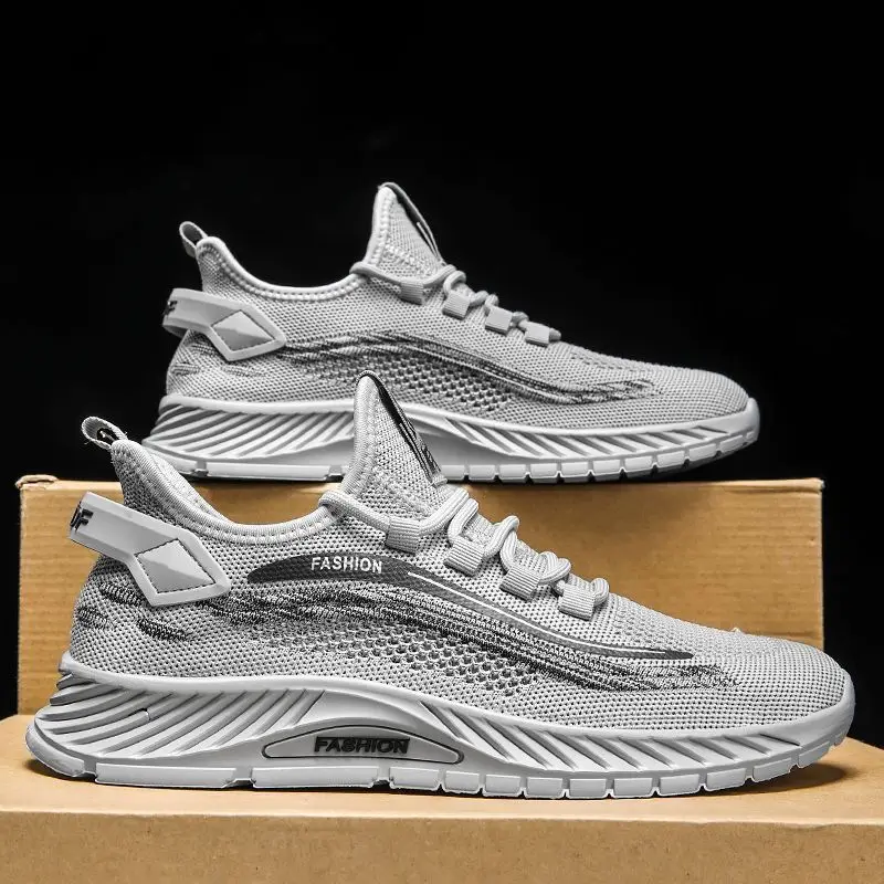 

New Spring and Autumn fashion casual sports shoes, breathable and trendy mesh fabric flying woven sports men's shoes