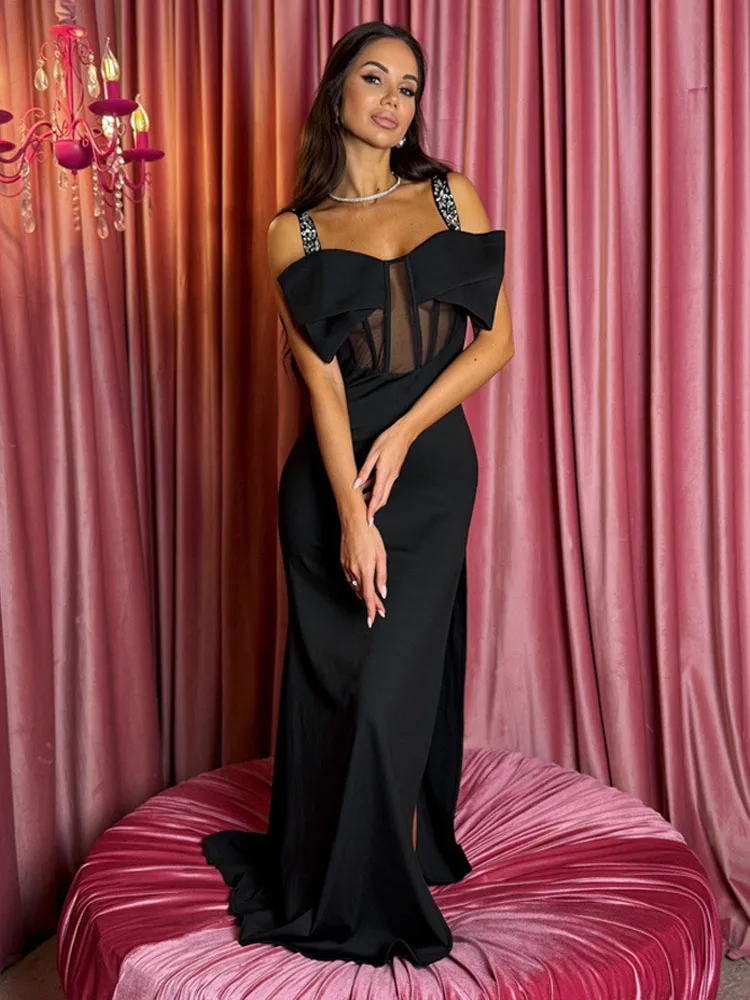 

Glamorous Black Spaghetti Straps Long Dress with Bow & Sheer Cut - Out Details - Upscale Events Formal Party Evening Gown