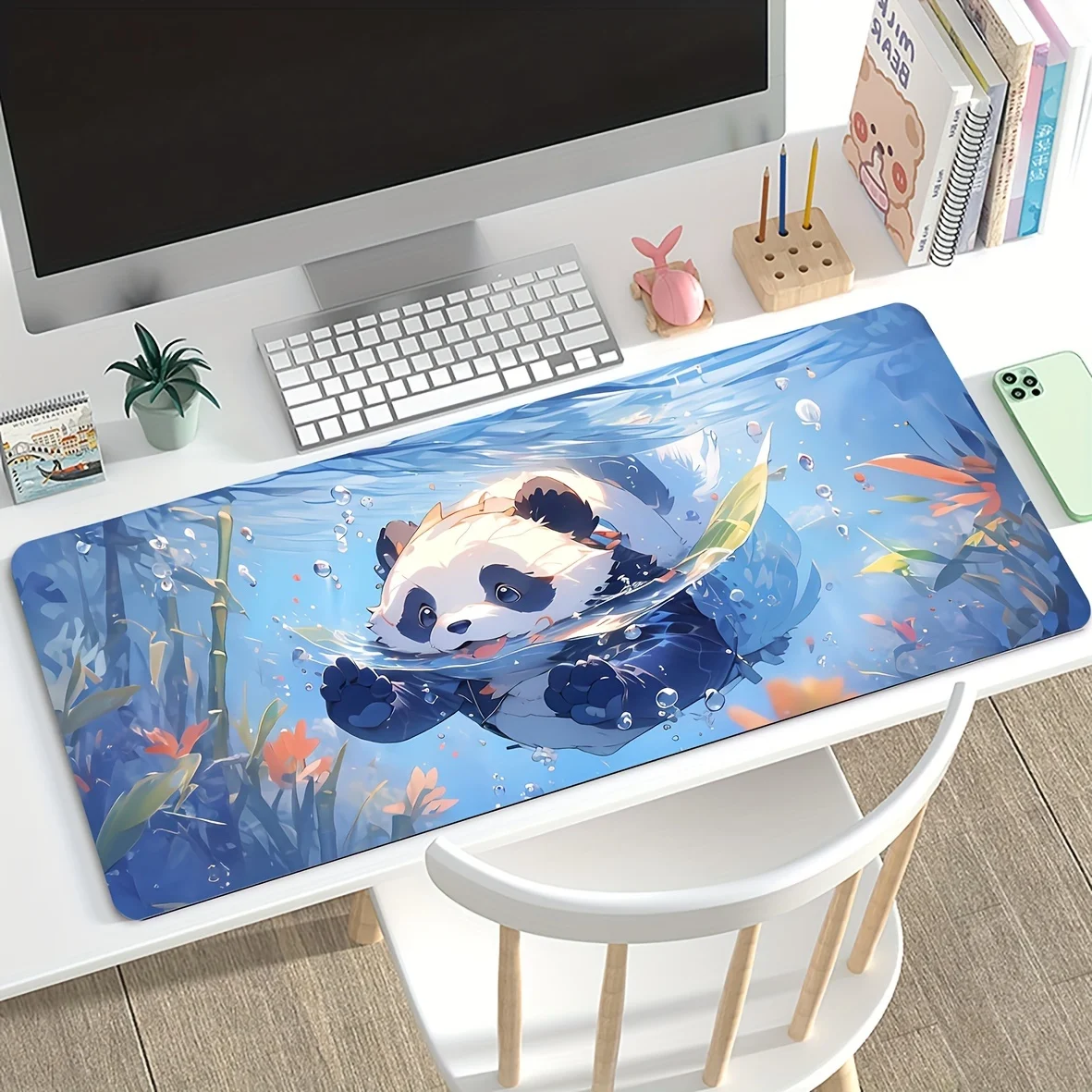 

The cute anime panda swimming mouse pad is suitable for gamers and office use as a high-definition printed computer accessory