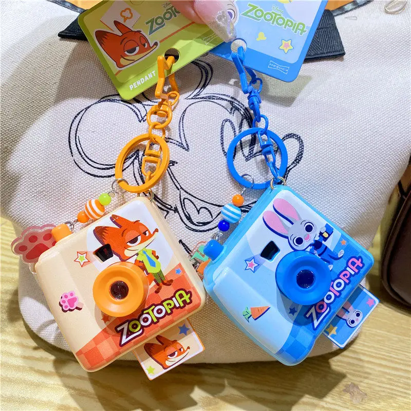 

New Cartoon Disney Zootopia Rabbit Judy Fox Nick Doll Keychain Women School Bag Keychain Camera Series Mobile Phone Charms Gift