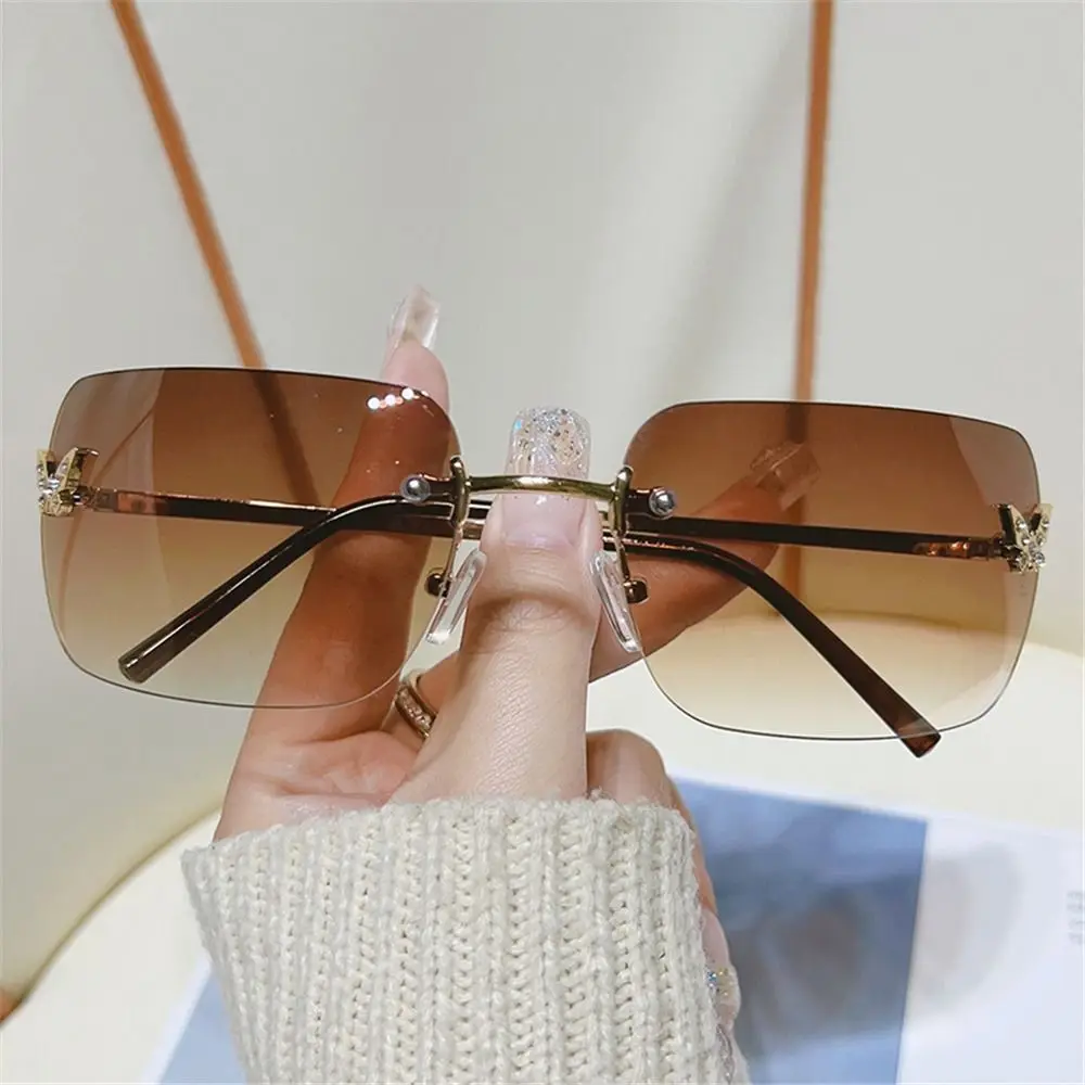 

Trendy Eyewear Shades Rimless Rectangle Sun Glasses Y2K Sunglasses for Women Rhinestone Butterfly Sunglasses
