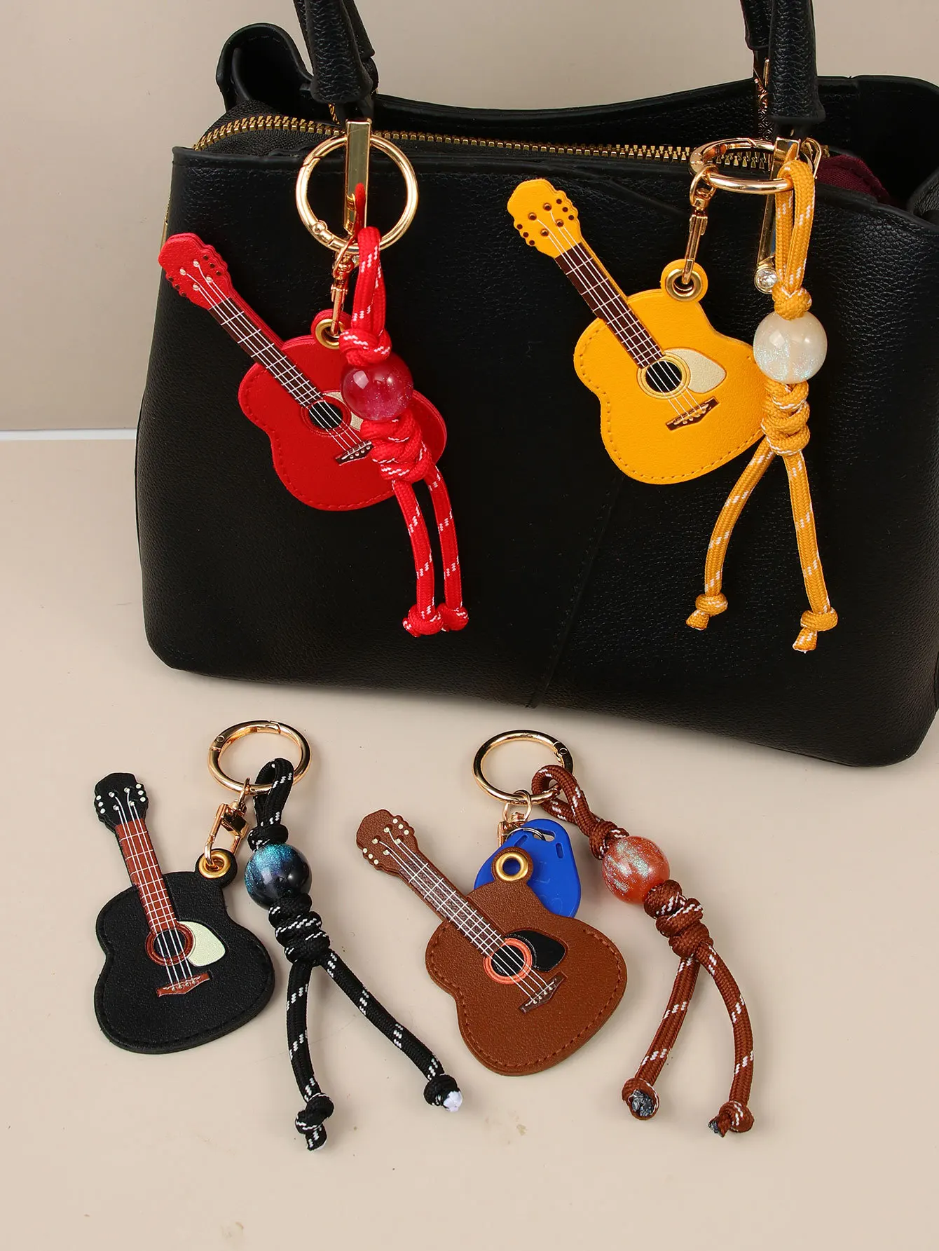 Cute PU Mini Guitar Keychain Beaded Braided Rope Bag Charm Key Ring Pendant Gift for Music Fans