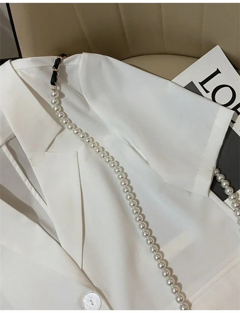 เสื้อผ้าสีขาว 2025 ฤดูร้อนสไตล์เกาหลีเสื้อและกางเกงขาสั้นสําหรับผู้หญิงชุดกางเกงขาสั้นสตรีชุด 2 ชิ้น