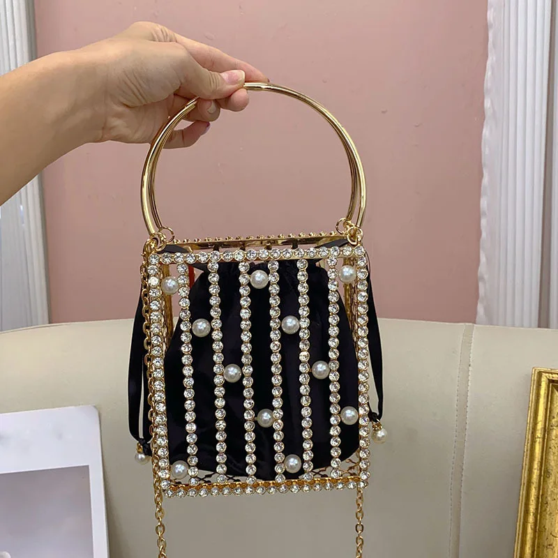 

Metal shiny ineffectual rhinestone bird cage dinner bag celebrity pearl light luxury personality simple hollow handbag