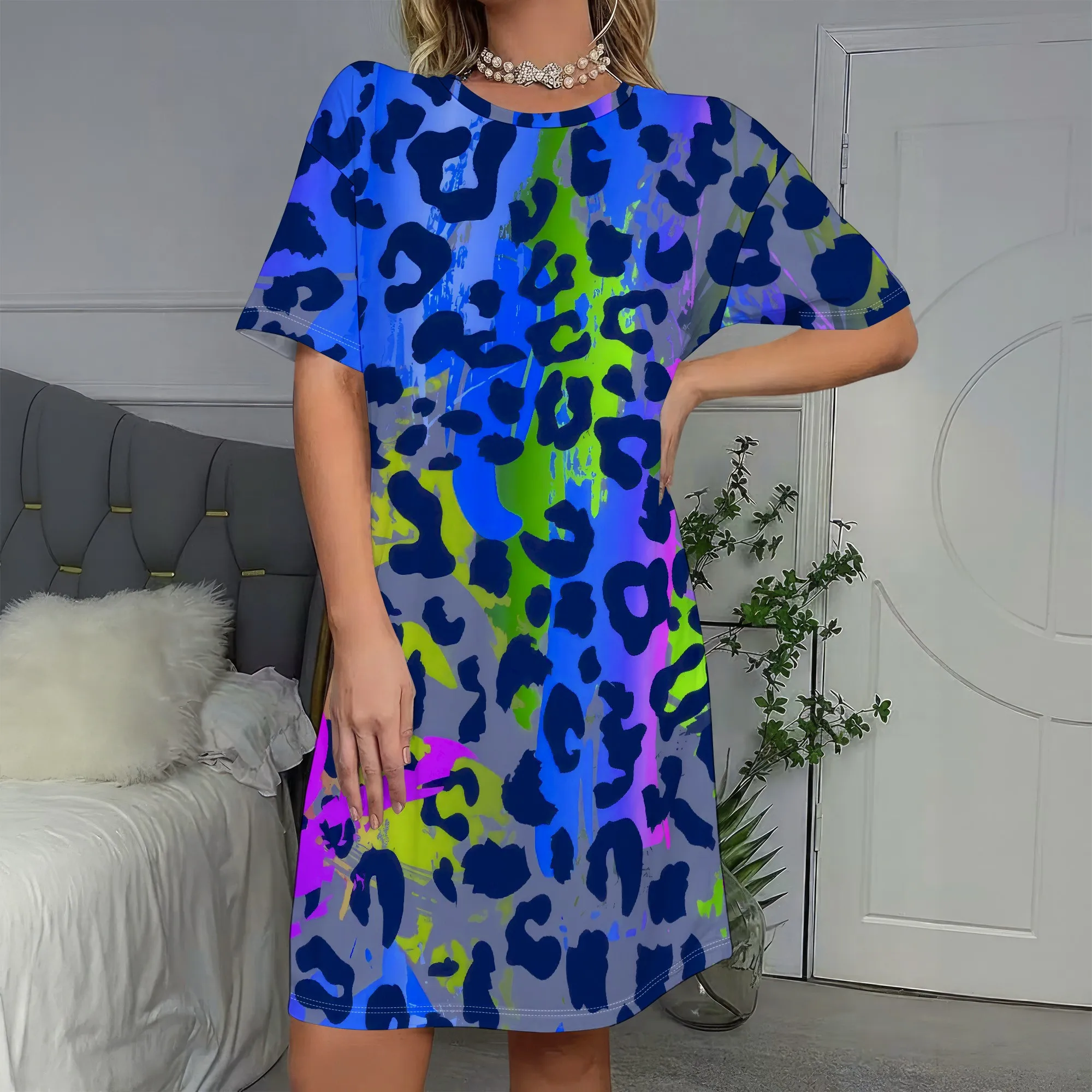 

Vibrant Blue Leopard Print, Short Sleeve T-Shirt Dress, Neon Green & Purple Pattern, Casual Loose Fit, S-2XL