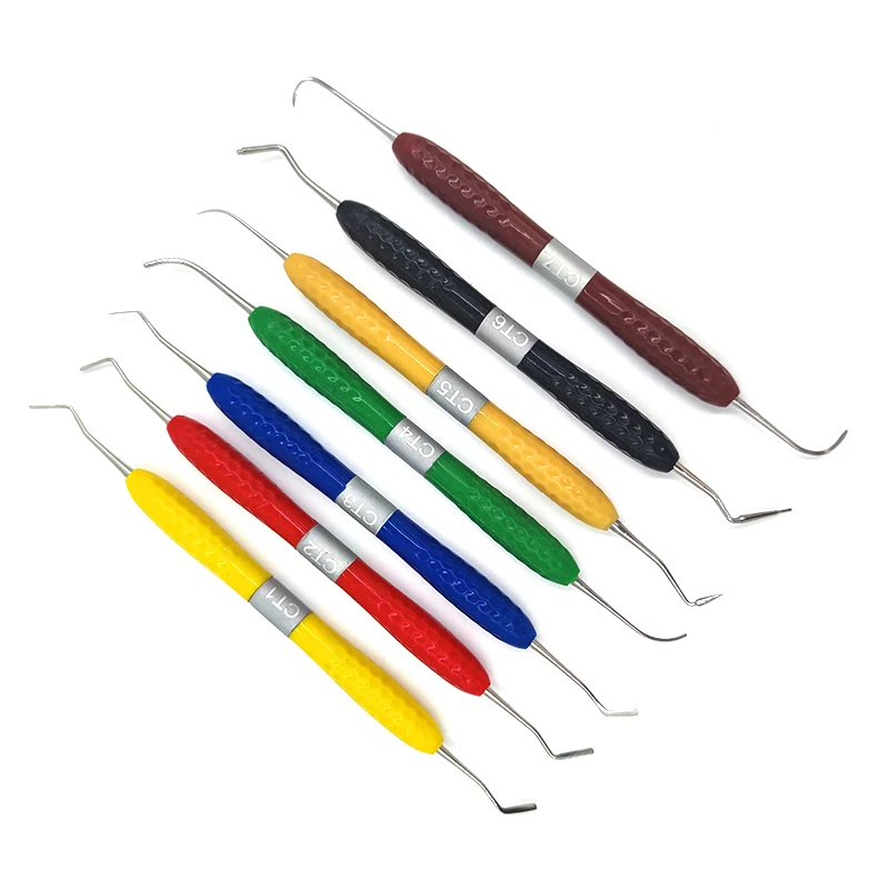 Ensemble de 7 outils de restauration esthétique en résine dentaire avec manche en silicone, comprenant couteau et spatule en résine.