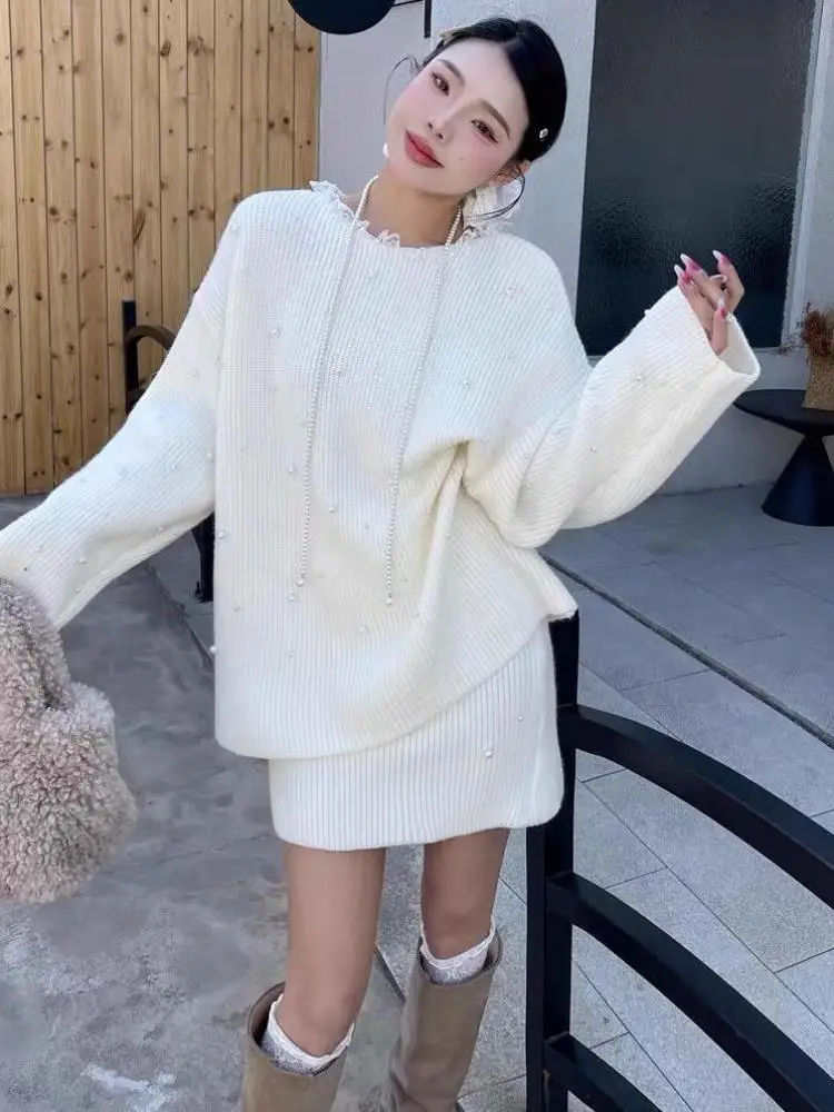 

Осенне-зимний женский комплект из двух предметов, французский модный вязаный свитер с круглым вырезом и короткая юбка с высокой талией, трендовый костюм