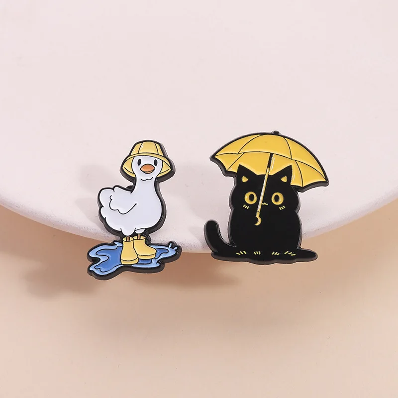 Animal Brooch Cute Kitten Holding Umbrella and Duck Stepping on Water Metal Badge Small Accessories Wholesale Bag Pins for Caps