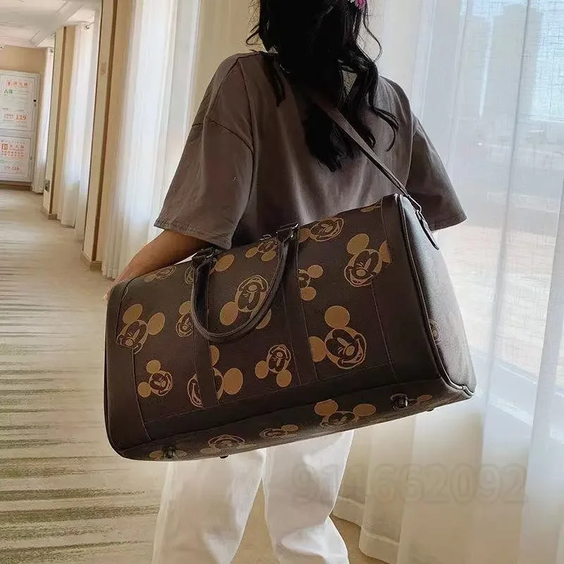 Disney Mickey nouvelle mode femmes sac fourre-tout de voyage hommes et femmes sac à bagages grande capacité une épaule sac de messager