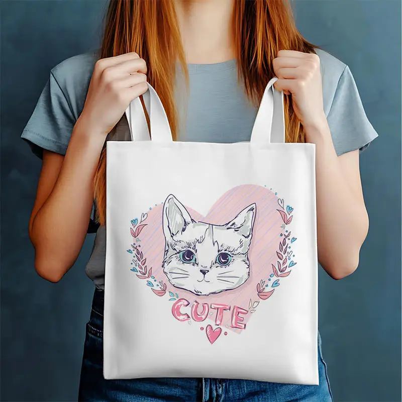 Customizable white canvas tote bag with personalized print; a durable, high-capacity, minimalist, and trendy bag—perfect for out