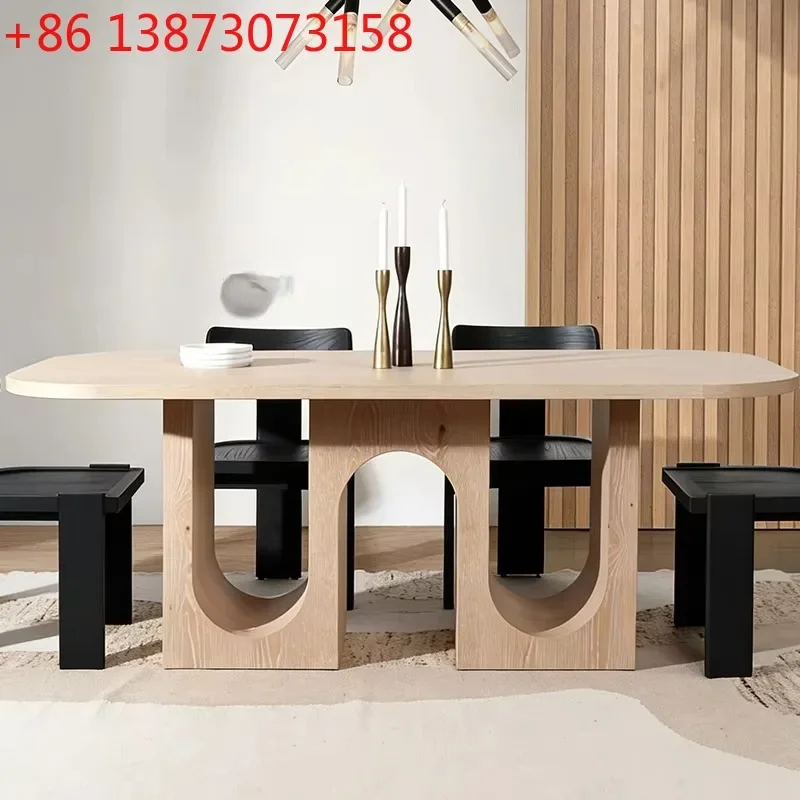 Dining table with plywood base, with carved U-shaped cutouts and light wood finishes, suitable for modern spaces
