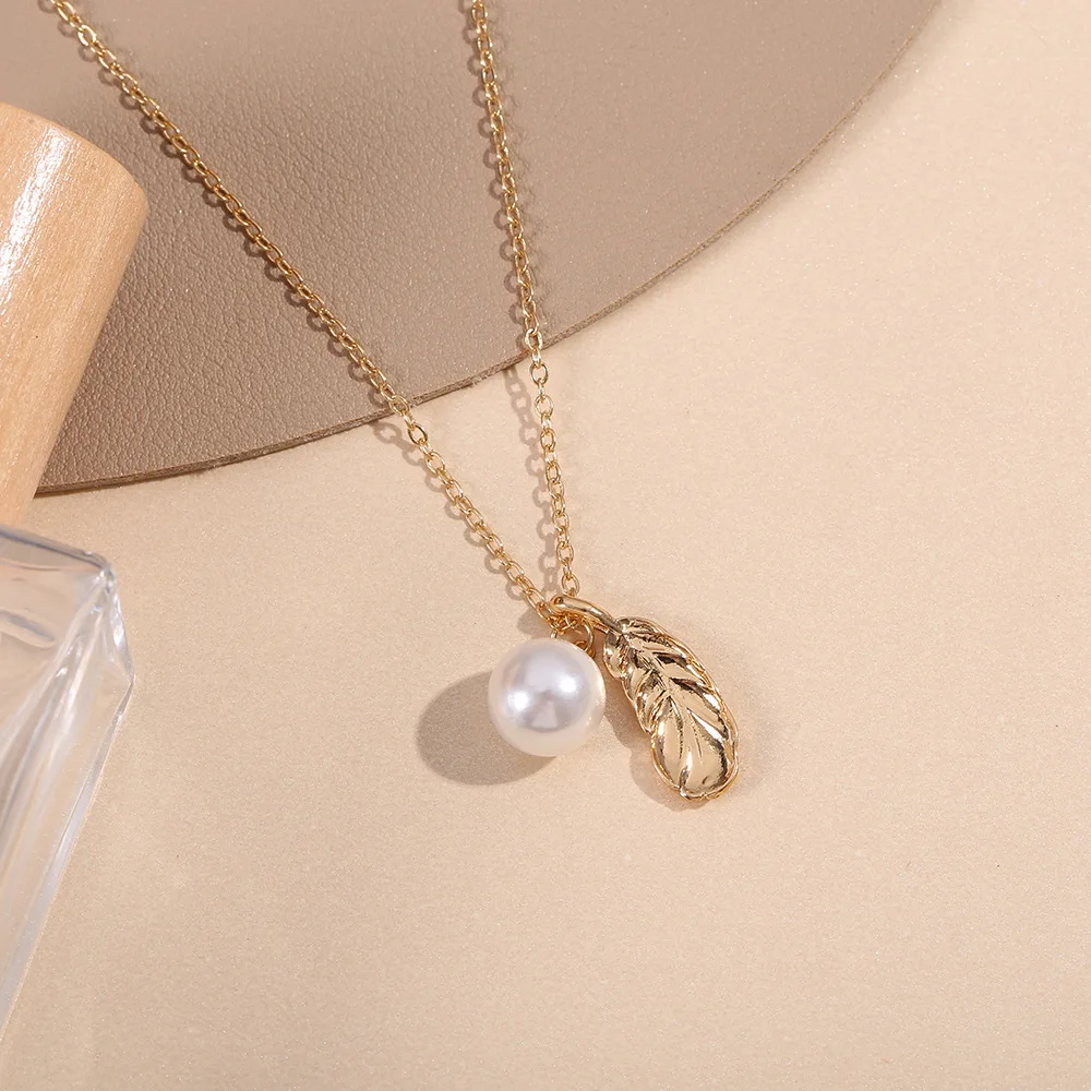 New Gold Feather Pearl Light Luxury Versatile Neckchain Collar Chain Necklace Female Jewelry Wholesale And Retail Mainland China