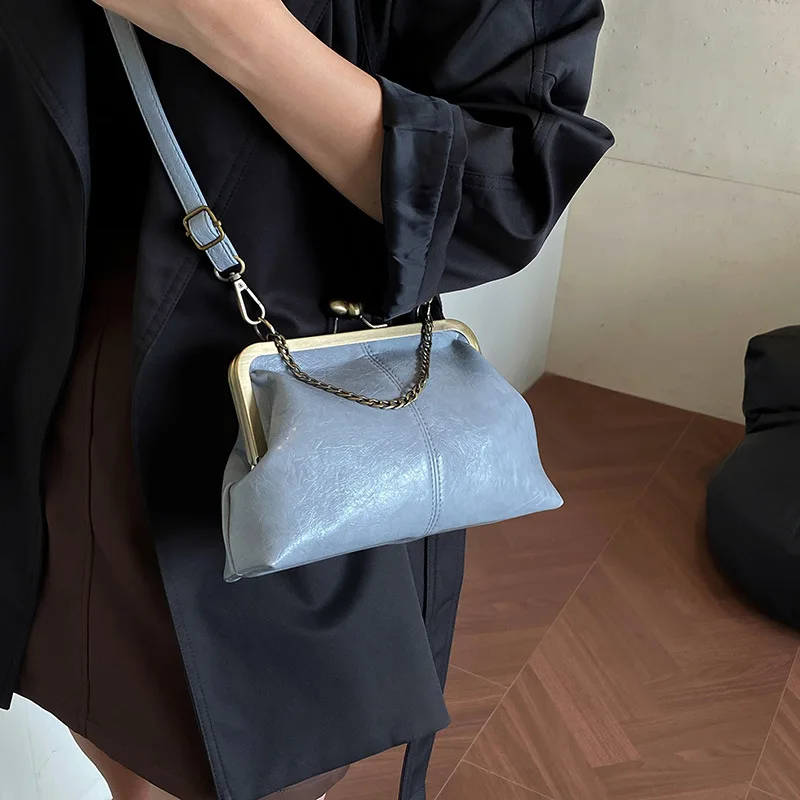 حقيبة دلو نسائية ذات سعة كبيرة لعام 2025، حقيبة كروس من الجلد الطبيعي متعددة الاتجاهات، محفظة كتف عتيقة للتنقل في العمل #1