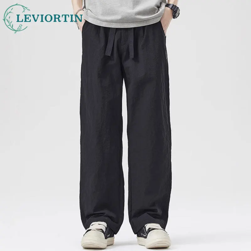 

Men's summer new slim American style loose, simple, versatile, multifunctional elastic waistband, casual straight leg pants
