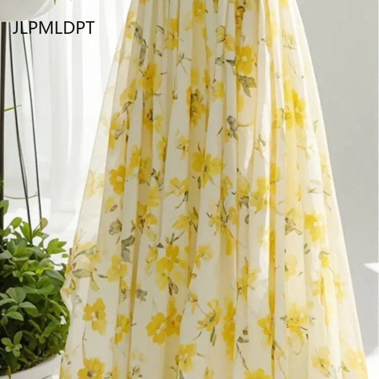 Yellow floral skirt women's 2025 summer new elastic waist design wears a unique A-shaped skirt