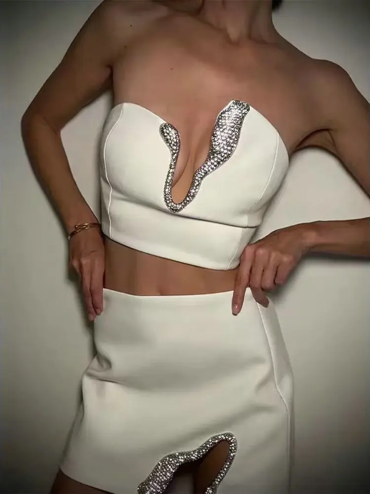 

2025 Новые летние модные женские элегантные комплекты из 2 предметов, короткие укороченные топы для девочек, сексуальные асимметричные мини-юбки, костюм, наряды